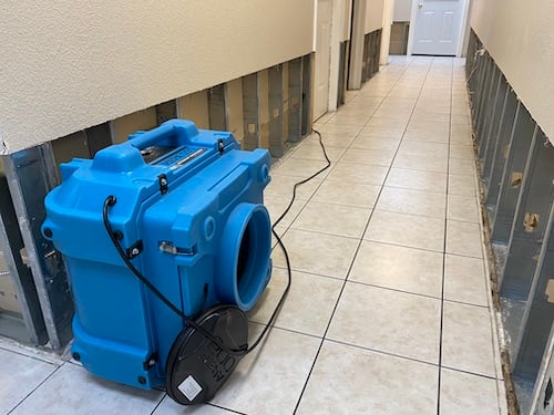 Air movers running to dry a water-damaged Florida home