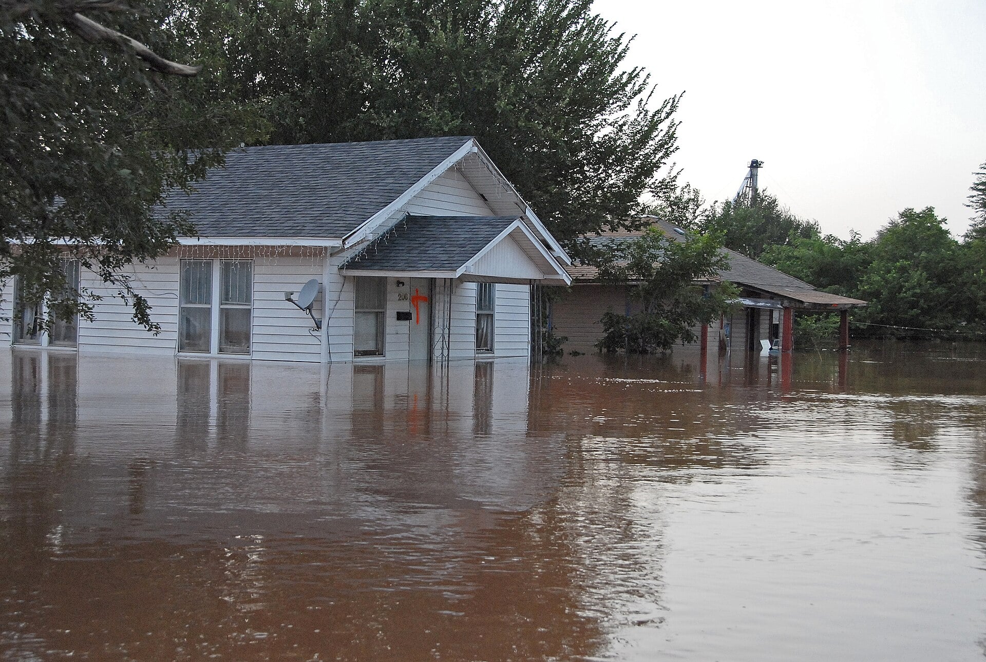 Standing water flooding a home interior